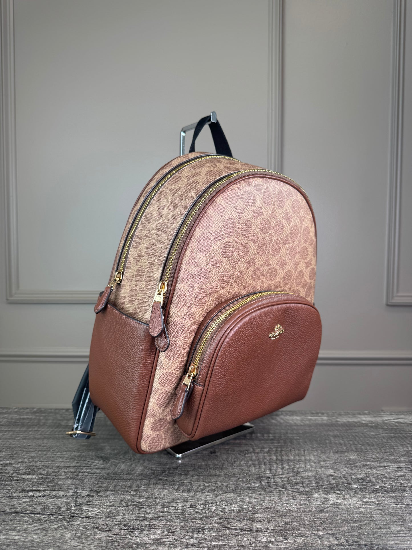 Mochila Coach cafe estampada camel