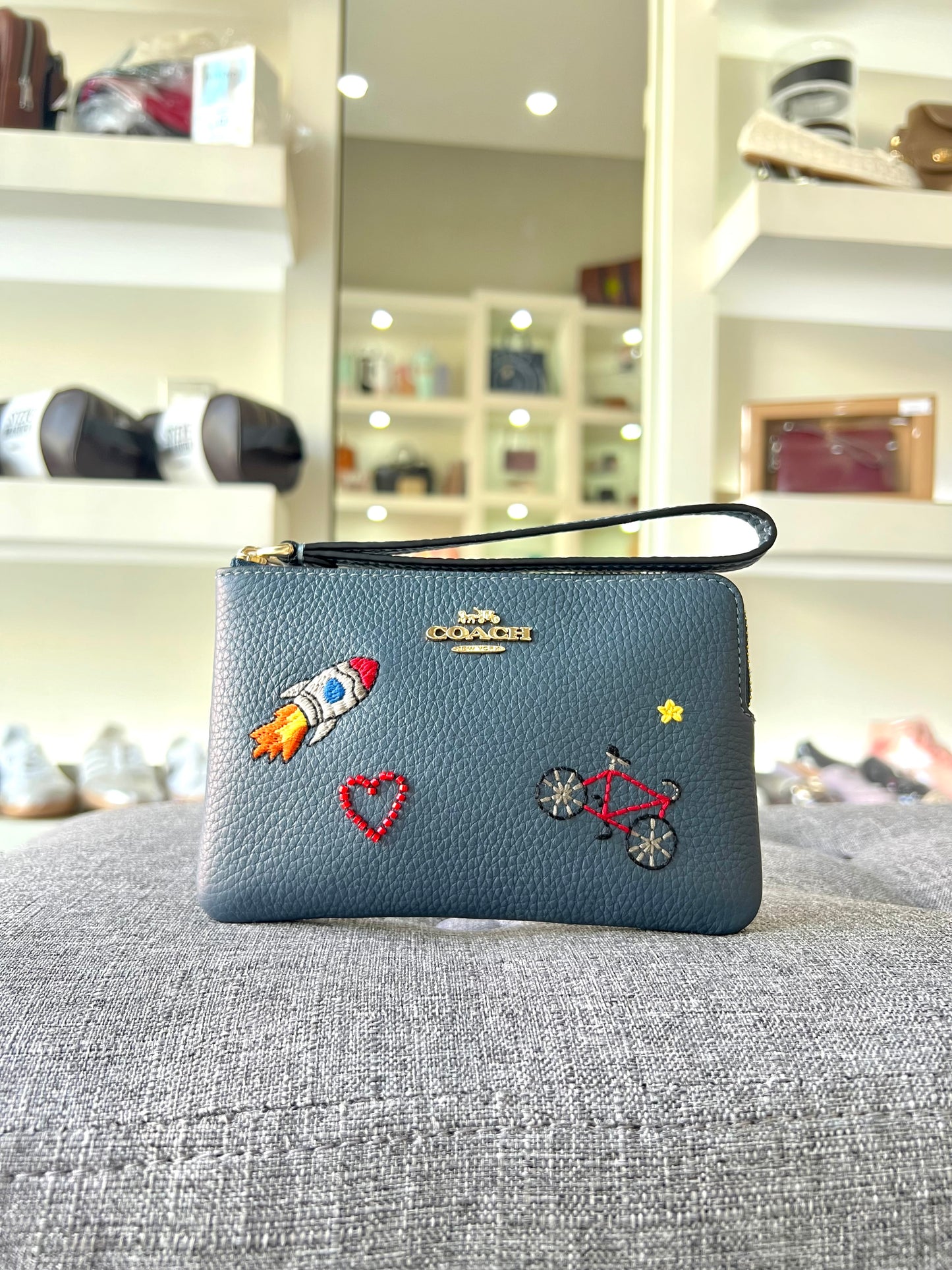 Muñequera coach azul cohete chica un cierre