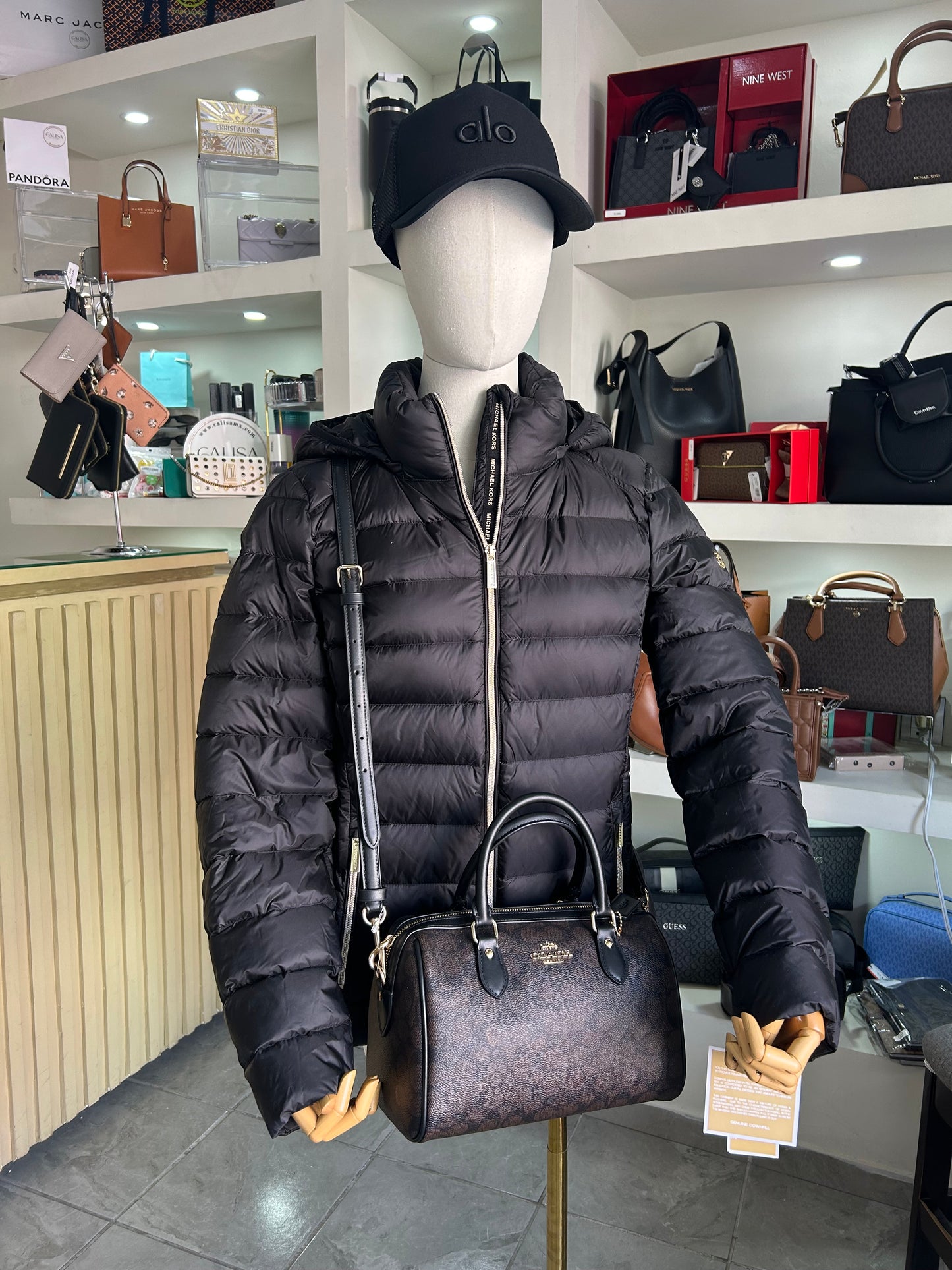 Bolsa Coach estampada chica