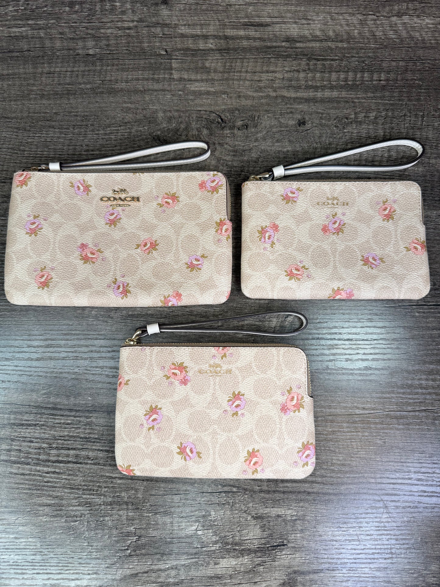 Muñequera Coach flores beige/blanco