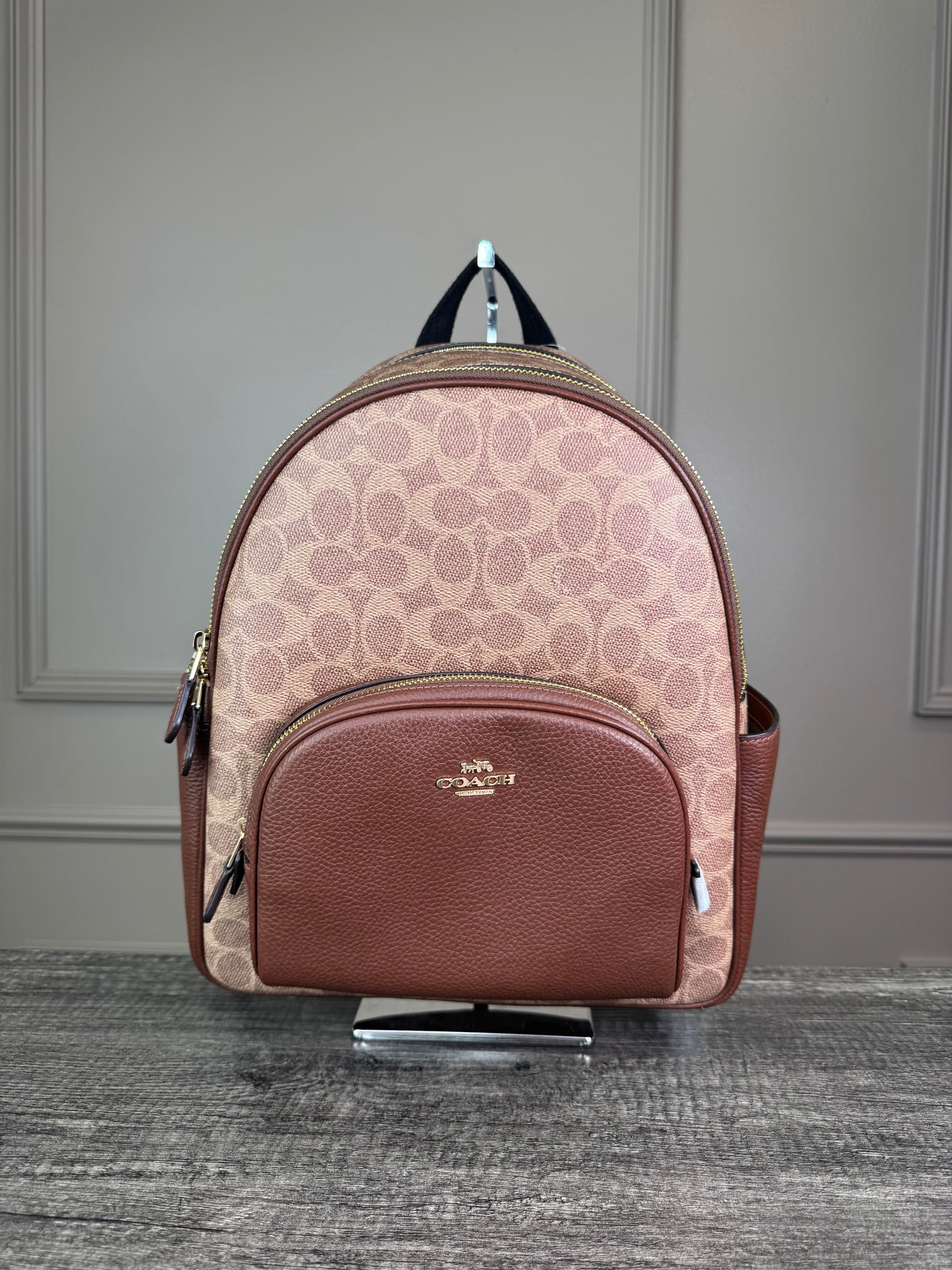 Mochila Coach cafe estampada camel