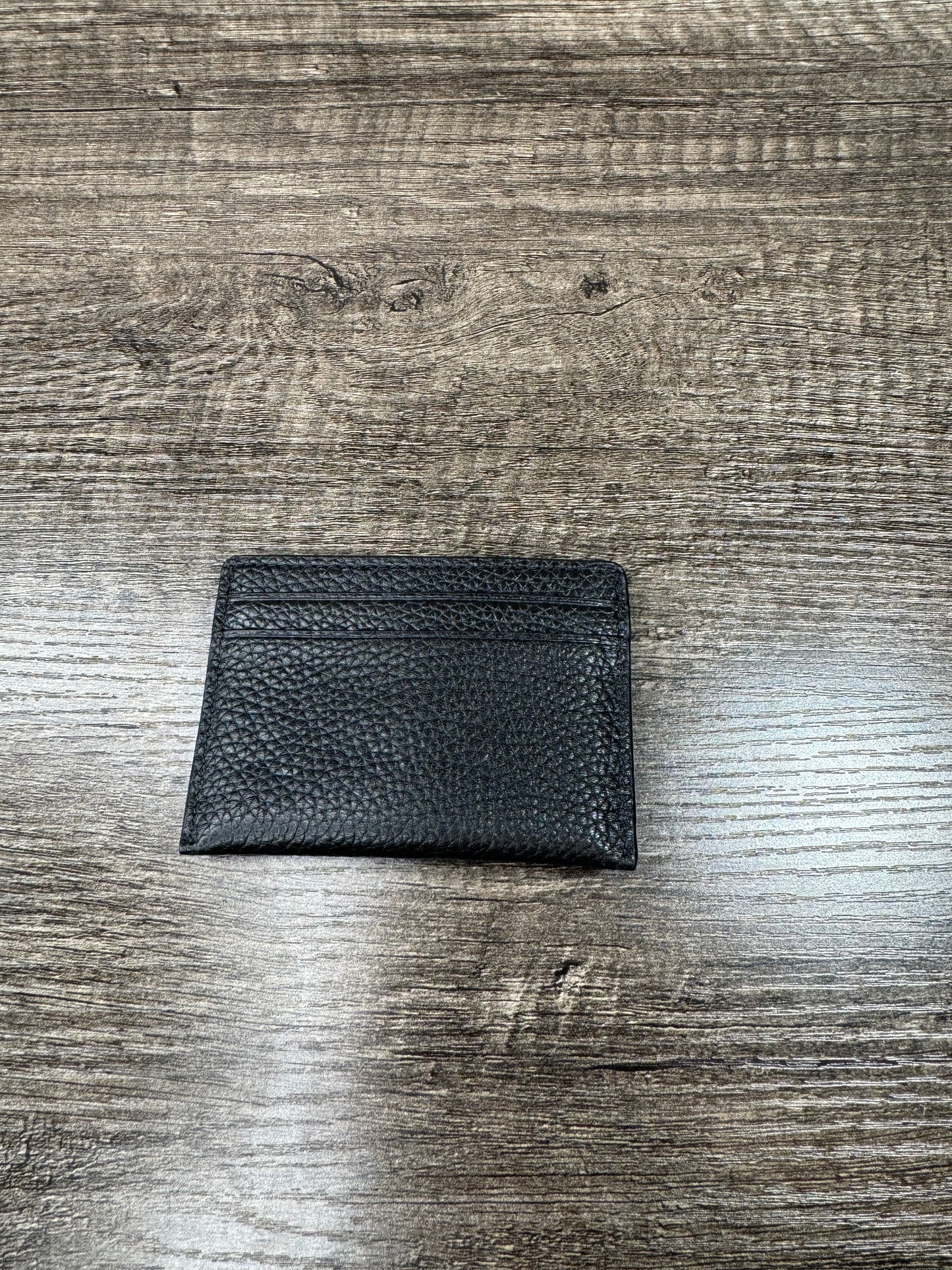 Tarjetero negro Michael Kors iniciales doradas