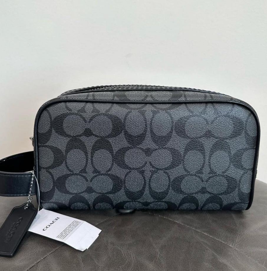 Sobaquera coach negra estampada