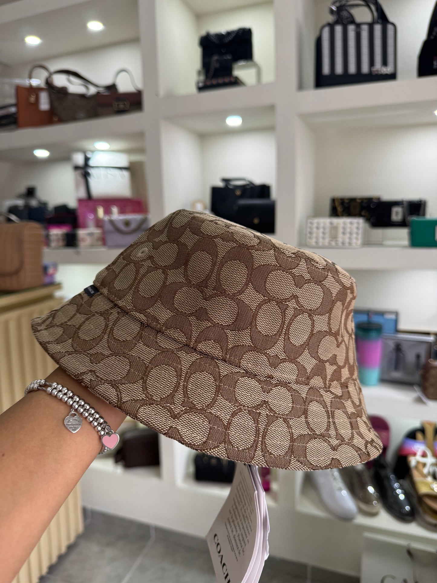 Bucket hat Coach cafe estampado