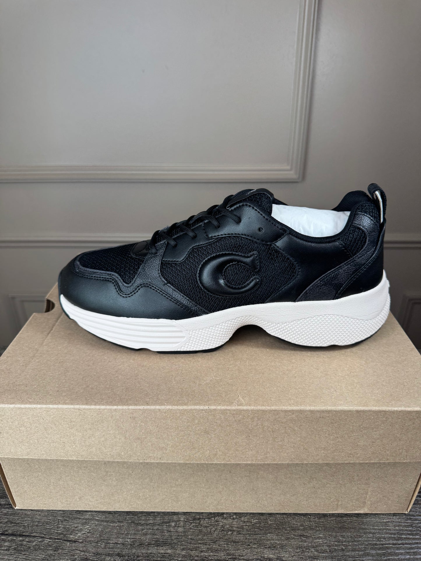Tens Coach negro