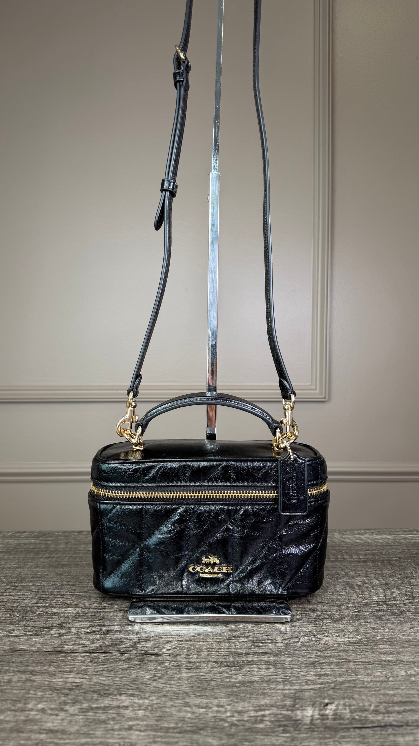 Bolsa Coach negra baul lisa