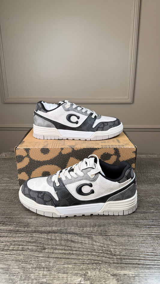 Teni Coach negro con blanco