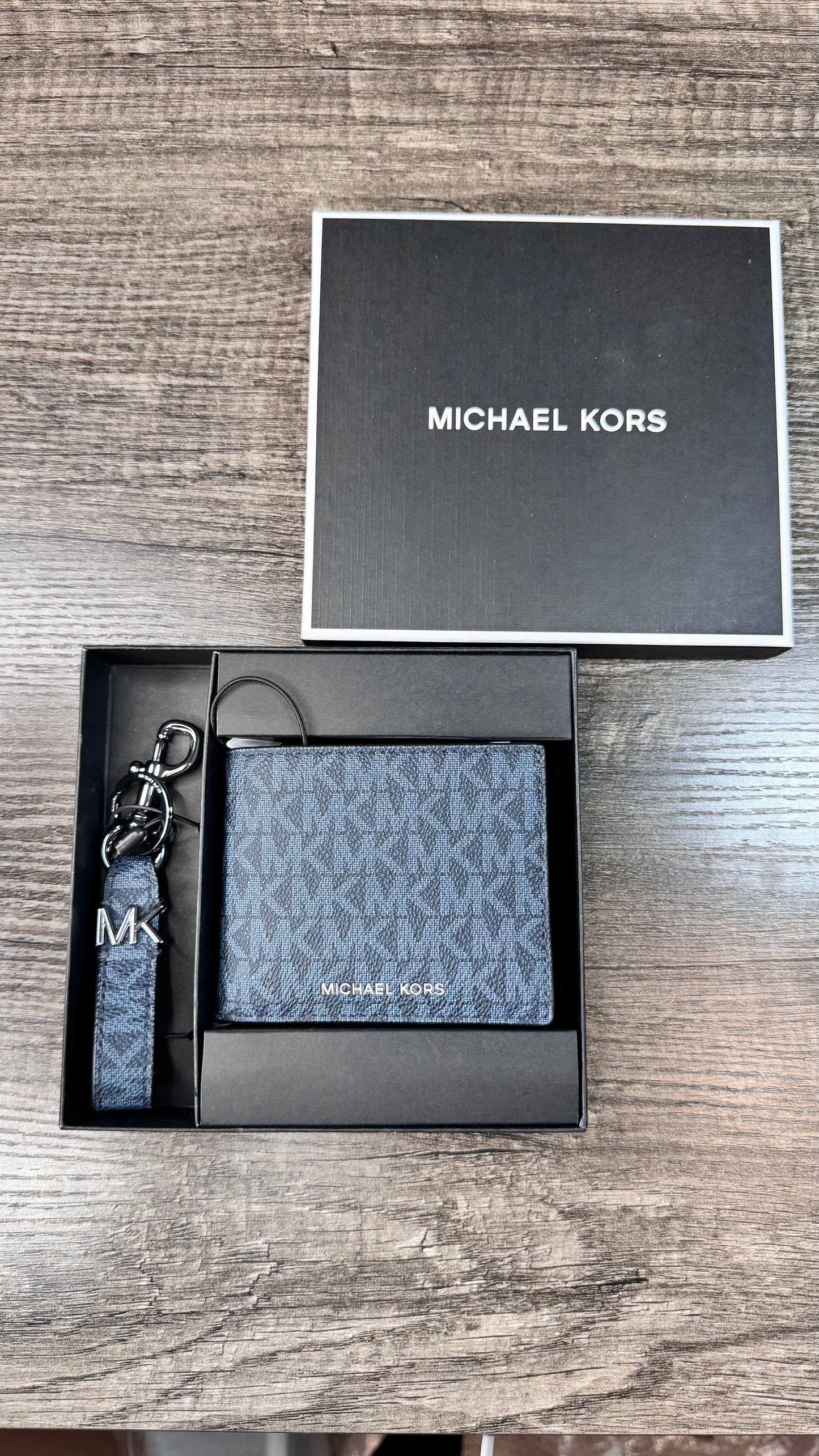 Set Cartera Michael kors azul marina de caballero estampada
