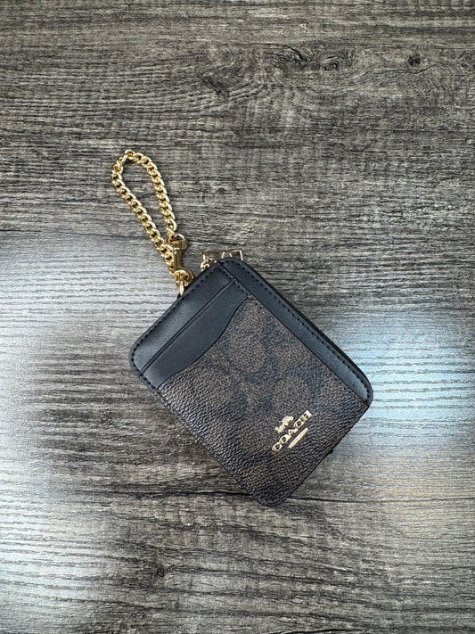Cartera coach estampada cafe chocolate
