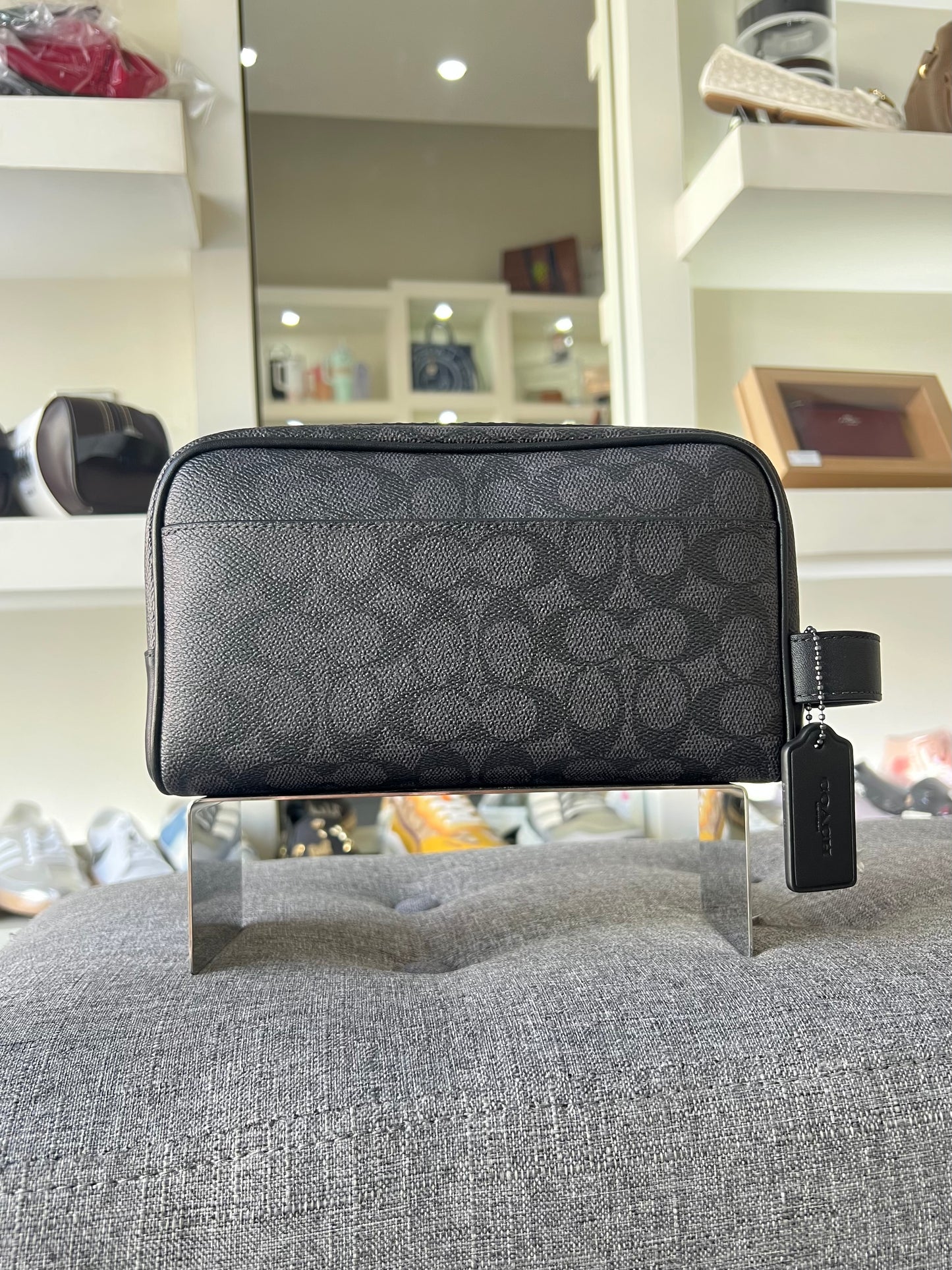 Sobaquera Coach negra estampada caballero