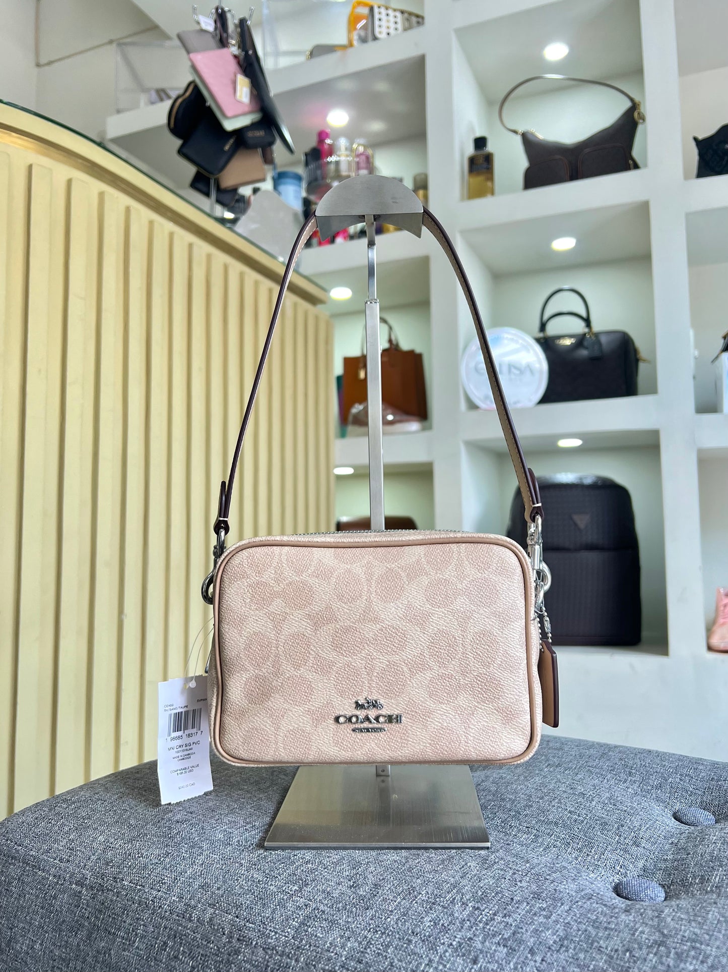 Bolsa Coach beige estampada