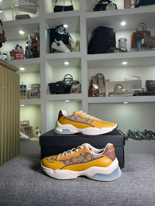 Teni Coach estampad/mostaza