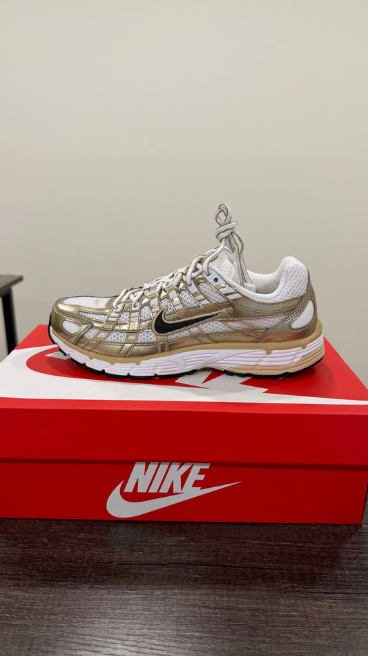Teni w nike p-6000 gold dorado