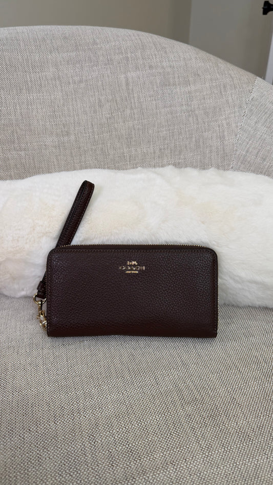 Cartera/muñequera grande Coach cafe maple Lisa