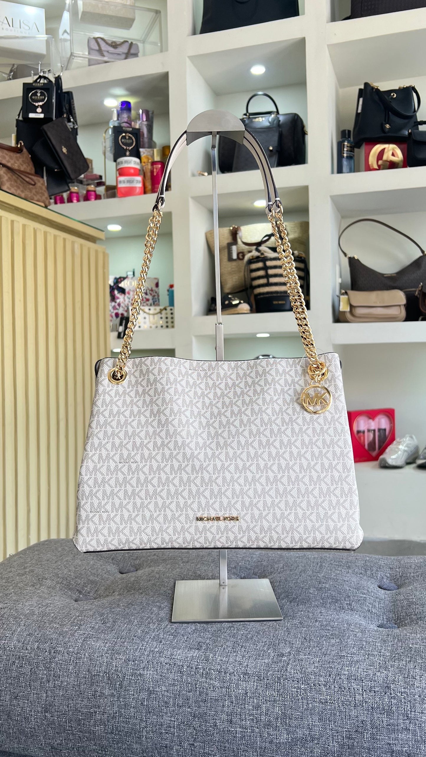 Bolsa Michael Kors beige estampada