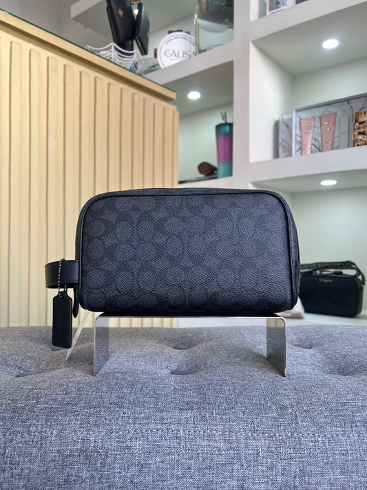 Sobaquera coach negra estampada