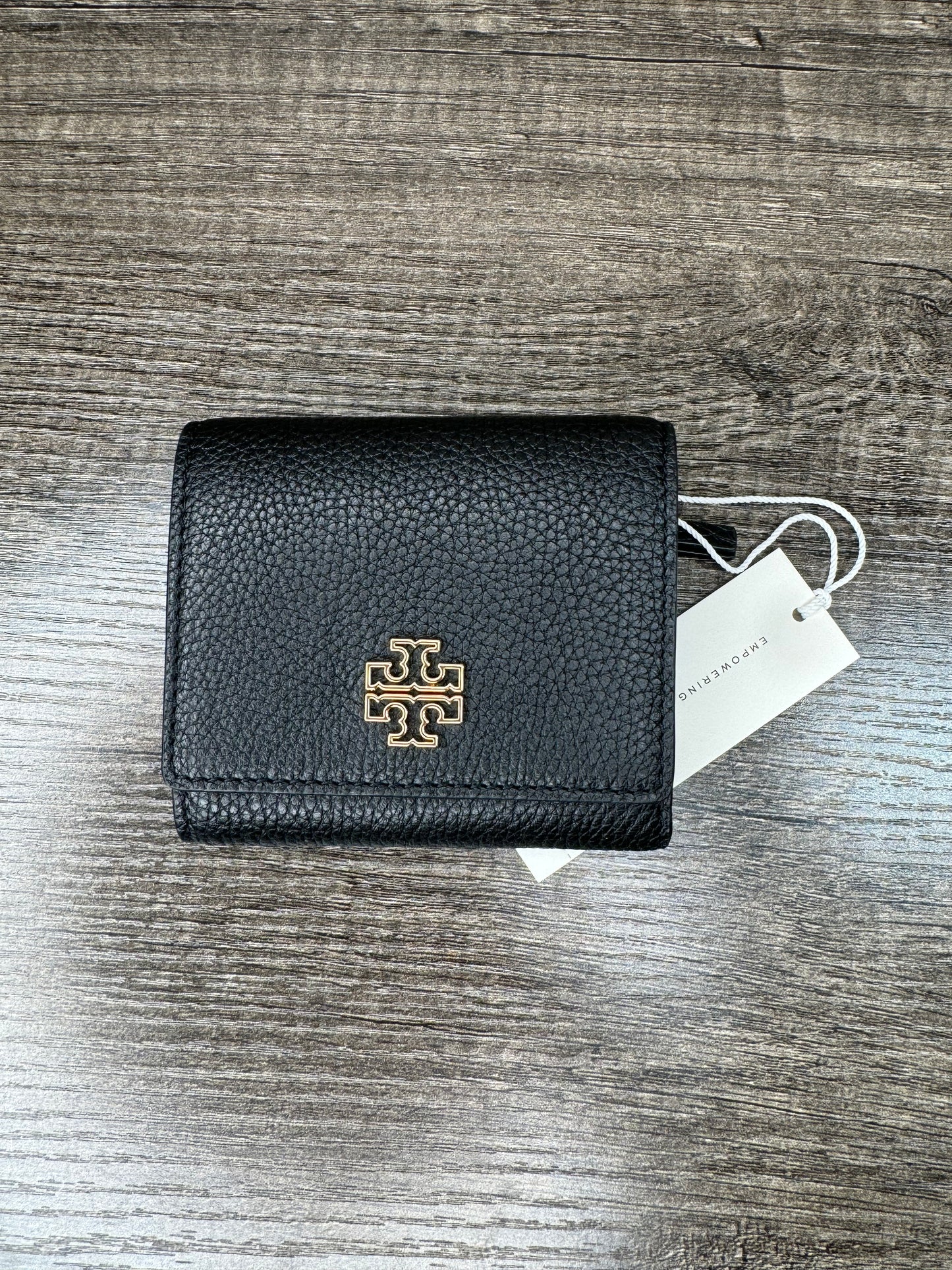 Cartera Tory negra lisa